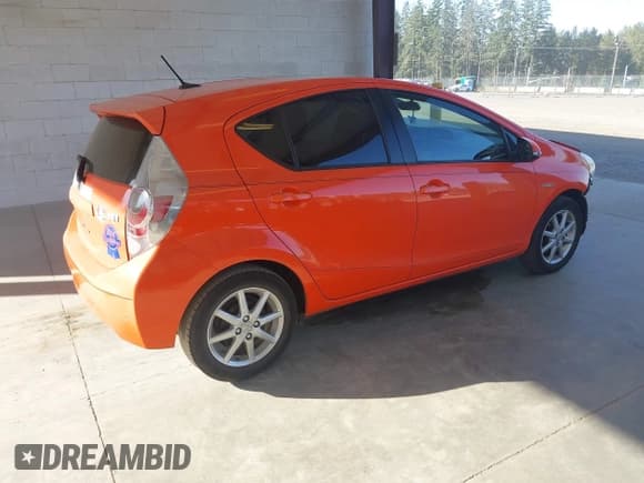 ✅ 2012 Toyota Prius One • VIN: JTDKDTB38C1015463 • Lot: 43221223. Listed on IAAI with 96,980 mi. Free auction sales archive from the USA and detailed vehicle history report at DreamBid. Image 4.