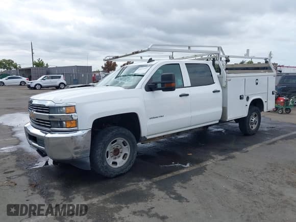 ✅ 2016 Chevrolet Silverado 2500HD Work Truck • VIN: 1GC1CUEG2GF102108 • Lot: 43471361. Listed on IAAI with 185,168 mi. Free auction sales archive from the USA and detailed vehicle history report at DreamBid. Image 2.