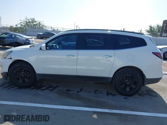 ✅ 2016 Chevrolet Traverse LT • VIN: 1GNKRGKD1GJ133482 • Lot: 43608909. Listed on IAAI with 140,447 mi. Free auction sales archive from the USA and detailed vehicle history report at DreamBid. Image 14.