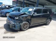 ✅ 2013 Scion xB • VIN: JTLZE4FE0DJ039758 • Lot: 42654188. Listed on IAAI with 105,406 mi. Free auction sales archive from the USA and detailed vehicle history report at DreamBid. Image 2.