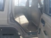 ✅ 1995 Jeep Cherokee Sport • VIN: 1J4FJ68S3SL555908 • Lot: 42222016. Listed on IAAI with 283,444 mi. Free auction sales archive from the USA and detailed vehicle history report at DreamBid. Image 8.