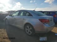 ✅ 2014 Chevrolet Cruze 2LT • VIN: 1G1PE5SB9E7385335 • Lot: 90363885. Listed on Copart with 138,490 mi. Free auction sales archive from the USA and detailed vehicle history report at DreamBid. Image 2.