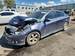 ✅ 2013 Chevrolet Cruze 1LT • VIN: 1G1PC5SBXD7245640 • Lot: 71900805. Listed on Copart with 141,471 mi. Free auction sales archive from the USA and detailed vehicle history report at DreamBid. Image 1.