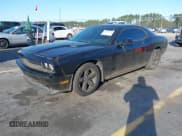 ✅ 2014 Dodge Challenger SXT • VIN: 2C3CDYAG7EH304459 • Lot: 43682366. Listed on IAAI with 197,016 mi. Free auction sales archive from the USA and detailed vehicle history report at DreamBid. Image 17.