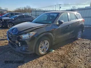 ✅ 2016 Mazda CX-5 Sport • VIN: JM3KE4BY4G0633512 • Lot: 95995615. Listed on Copart with 154,369 mi. Free auction sales archive from the USA and detailed vehicle history report at DreamBid. Image 1.