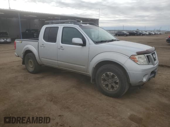 ✅ 2014 Nissan Frontier Pro-4X • VIN: 1N6AD0EV1EN741231 • Lot: 51704525. Wystawiony na Copart z przebiegiem 126 708 mil. Bezpłatny archiwum sprzedaży aukcyjnych z USA i szczegółowy raport historii pojazdu na DreamBid. Zdjęcie 4.