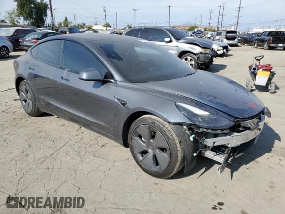 ✅ 2022 Tesla Model 3 • VIN: 5YJ3E1EA6NF249868 • Лот: 91277405. Опубликован ранее на Copart с пробегом 50 662 миль. Бесплатный доступ к архиву аукционных продаж из США и подробный отчёт об истории автомобиля на DreamBid. Изображение 4.