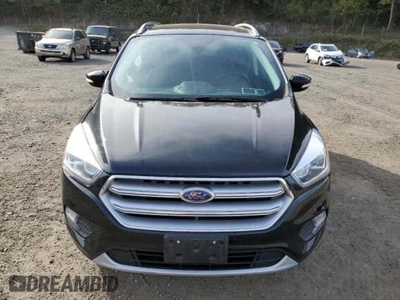 ✅ 2017 Ford Escape Titanium • VIN: 1FMCU9J9XHUD14869 • Лот: 84791895. Опубликован ранее на Copart с пробегом 66 292 миль. Бесплатный доступ к архиву аукционных продаж из США и подробный отчёт об истории автомобиля на DreamBid. Изображение 5.