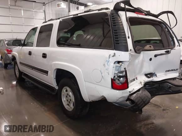 2005 Chevrolet Suburban LS z VIN 1GNFK16Z45J176719, wystawiony jako IAAI lot #42325067 z przebiegiem 199 884 mil mil oraz . Historia ofert i sprzedaży dostępna na DreamBid. Obrazek 3.