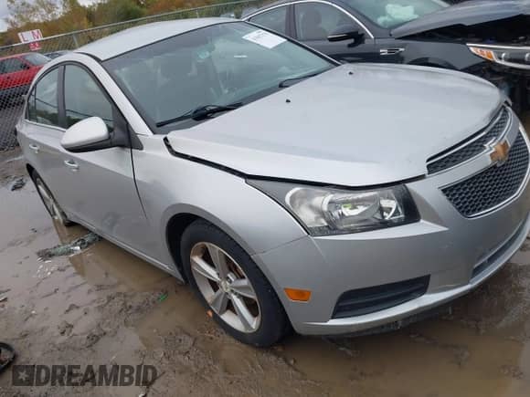 2014 Chevrolet Cruze 2LT with VIN 1G1PE5SB0E7135532, listed as a IAAI auction lot 43507178 with 100,363 mi miles and . Bid and sale history available at DreamBid. Image 1.