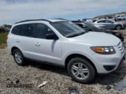 ✅ 2011 Hyundai Santa Fe GLS • VIN: 5XYZGDAG9BG019780 • Lot: 61862875. Listed on Copart with 182,897 mi. Free auction sales archive from the USA and detailed vehicle history report at DreamBid. Image 4.