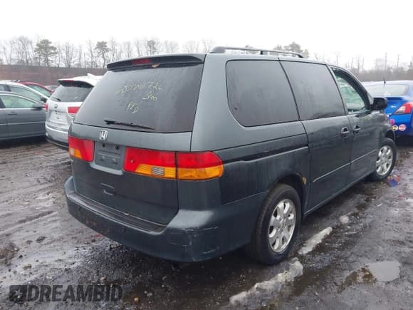 ✅ 2004 Honda Odyssey EX-L • VIN: 5FNRL18784B074778 • Lot: 41604779. Listed on IAAI with Not provided. Free auction sales archive from the USA and detailed vehicle history report at DreamBid. Image 4.