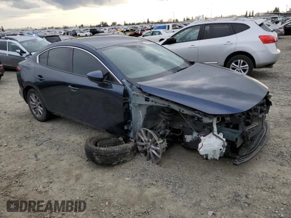 ✅ 2022 Mazda 3 S • VIN: 3MZBPAAL5NM301612 • Lot: 47450825. Listed on Copart with 46,978 mi. Free auction sales archive from the USA and detailed vehicle history report at DreamBid. Image 4.