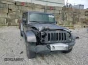 ✅ 2014 Jeep Wrangler Unlimited Sahara • VIN: 1C4BJWEG0EL258765 • Lot: 84206115. Wystawiony na Copart z przebiegiem 143 903 mil. Bezpłatny archiwum sprzedaży aukcyjnych z USA i szczegółowy raport historii pojazdu na DreamBid. Zdjęcie 14.