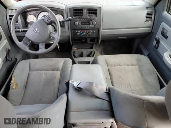 2005 Dodge Dakota ST с VIN 1D7HE28K15S119697, выставлен на аукционе Copart как лот 64600145 с пробегом 124 491 миль миль и Списание • Salvage title. История ставок и продаж доступна на DreamBid. Изображение 8.