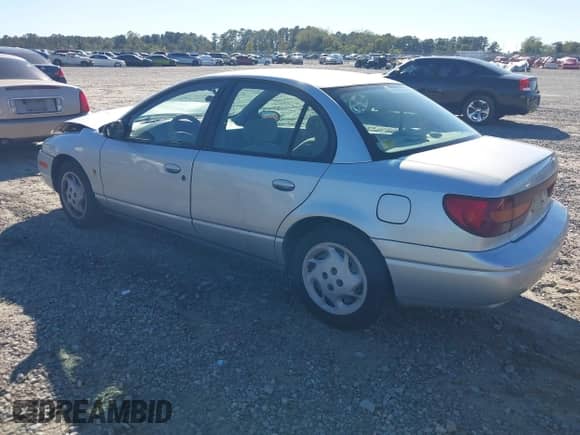 2002 Saturn SL с VIN 1G8ZK52702Z243549, выставлен на аукционе IAAI как лот 43488210 с пробегом 155 263 миль миль и . История ставок и продаж доступна на DreamBid. Изображение 3.