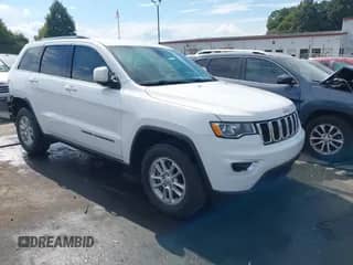 2018 Jeep Grand Cherokee Altitude z VIN 1C4RJFAGXJC504400, wystawiony jako IAAI lot #43318140 z przebiegiem 100 572 mil mil oraz . Historia ofert i sprzedaży dostępna na DreamBid. Obrazek 1.