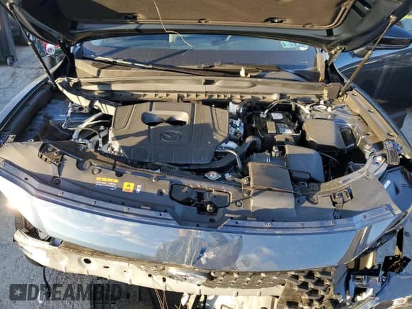 ✅ 2025 Mazda CX-50 S Premium • VIN: 7MMVABDM6SN350671 • Lot: 92092215. Listed on Copart with 3,960 mi. Free auction sales archive from the USA and detailed vehicle history report at DreamBid. Image 12.