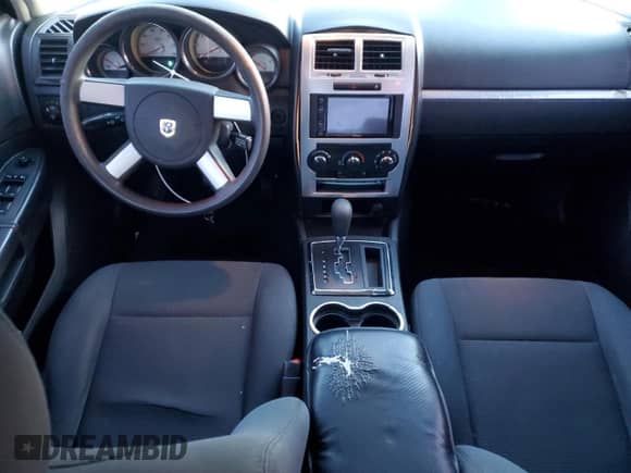 2010 Dodge Charger SXT с VIN 2B3CA3CV0AH285624, выставлен на аукционе Copart как лот 78438114 с пробегом 206 984 миль миль и Списание • Salvage title. История ставок и продаж доступна на DreamBid. Изображение 8.