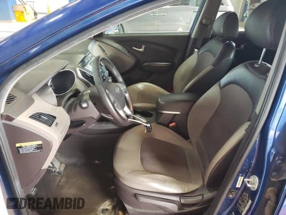 2013 Hyundai Tucson GLS z VIN KM8JUCACXDU758568, wystawiony jako Copart lot #72167974 z przebiegiem 188 013 mil mil oraz Szkoda całkowita • Salvage title. Historia ofert i sprzedaży dostępna na DreamBid. Obrazek 7.