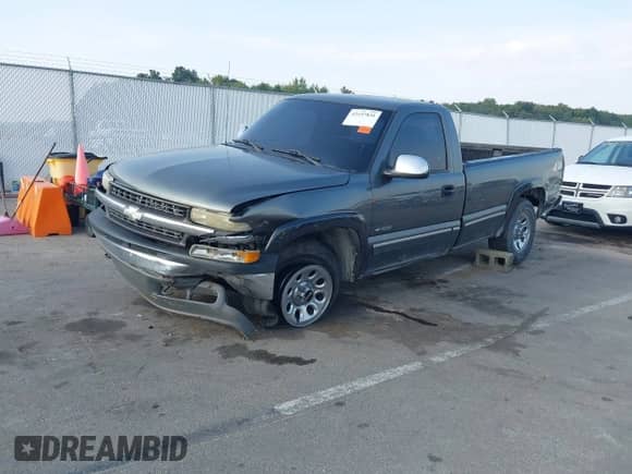 2002 Chevrolet Silverado 1500 LS z VIN 1GCEK14T12E143281, wystawiony jako IAAI lot #43197831 z przebiegiem 241 904 mil mil oraz . Historia ofert i sprzedaży dostępna na DreamBid. Obrazek 2.