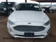 ✅ 2020 Ford Fusion Titanium • VIN: 3FA6P0D97LR191845 • Lot: 43775038. Wystawiony na IAAI z przebiegiem 98 931 mil. Bezpłatny archiwum sprzedaży aukcyjnych z USA i szczegółowy raport historii pojazdu na DreamBid. Zdjęcie 12.
