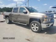 ✅ 2015 Chevrolet Silverado 1500 LT • VIN: 3GCPCREH4FG245882 • Lot: 69631235. Listed on Copart with 111,223 mi. Free auction sales archive from the USA and detailed vehicle history report at DreamBid. Image 4.