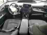 2022 Toyota Prius L Eco с VIN JTDKAMFUXN3175479, выставлен на аукционе Copart как лот 80868605 с пробегом Не указан миль и Списание • Salvage title. История ставок и продаж доступна на DreamBid. Изображение 8.