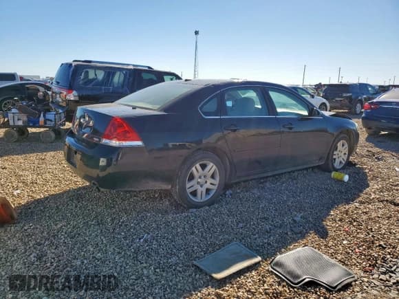 ✅ 2014 Chevrolet Impala LT • VIN: 2G1WB5E3XE1185540 • Лот: 90579415. Опубликован ранее на Copart с пробегом 105 489 миль. Бесплатный доступ к архиву аукционных продаж из США и подробный отчёт об истории автомобиля на DreamBid. Изображение 3.