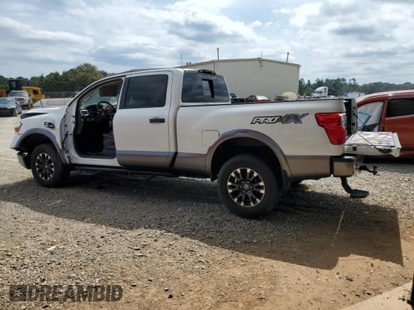 ✅ 2018 Nissan Titan Platinum Reserve • VIN: 1N6BA1F49JN521225 • Lot: 69831004. Listed on Copart with 92,536 mi. Free auction sales archive from the USA and detailed vehicle history report at DreamBid. Image 2.