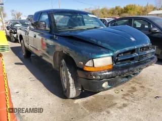 ✅ 1998 Dodge Dakota SLT • VIN: 1B7GL22X6WS661346 • Lot: 77401914. Wystawiony na Copart z przebiegiem 214 497 mil. Bezpłatny archiwum sprzedaży aukcyjnych z USA i szczegółowy raport historii pojazdu na DreamBid. Zdjęcie 4.