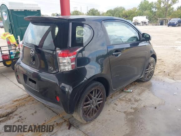 ✅ 2012 Scion iQ • VIN: JTNJJXB05CJ013179 • Lot: 43884452. Listed on IAAI with 123,307 mi. Free auction sales archive from the USA and detailed vehicle history report at DreamBid. Image 4.