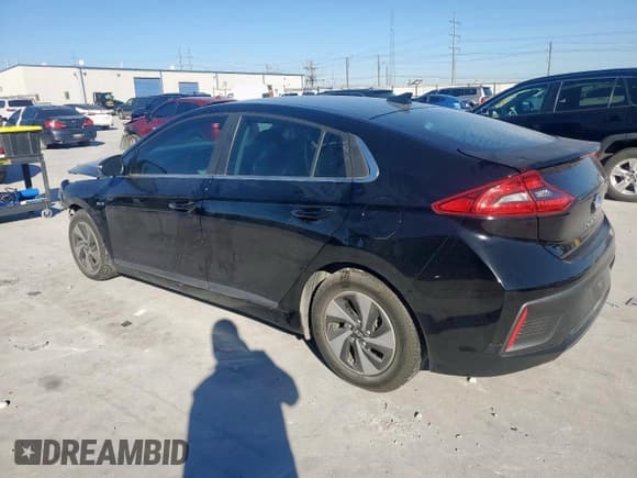 ✅ 2018 Hyundai Ioniq SEL • VIN: KMHC75LC7JU103708 • Лот: 90824735. Опубликован ранее на Copart с пробегом 90 346 миль. Бесплатный доступ к архиву аукционных продаж из США и подробный отчёт об истории автомобиля на DreamBid. Изображение 2.