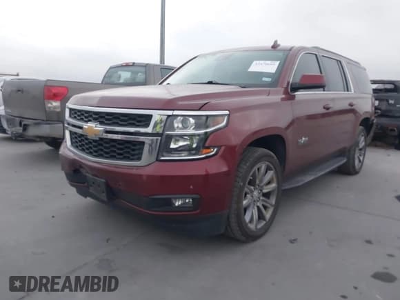✅ 2020 Chevrolet Suburban LT • VIN: 1GNSCHKC5LR229626 • Lot: 43470695. Listed on IAAI with 16,701 mi. Free auction sales archive from the USA and detailed vehicle history report at DreamBid. Image 2.