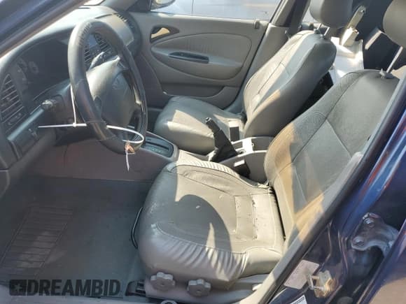 ✅ 2001 Daewoo Nubira CDX • VIN: KLAJB52Z31K647237 • Lot: 69299834. Wystawiony na Copart z przebiegiem 51 513 mil. Bezpłatny archiwum sprzedaży aukcyjnych z USA i szczegółowy raport historii pojazdu na DreamBid. Zdjęcie 7.