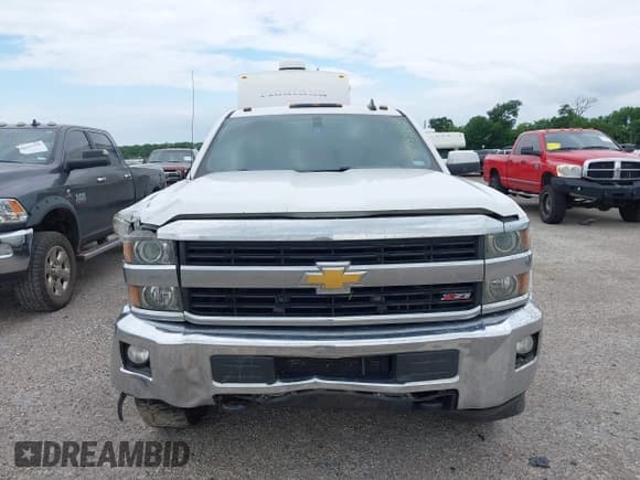 ✅ 2017 Chevrolet Silverado 2500HD LT • VIN: 1GC1KVEG6HF101957 • Lot: 42343984. Listed on IAAI with 313,934 mi. Free auction sales archive from the USA and detailed vehicle history report at DreamBid. Image 12.