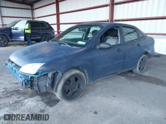 ✅ 2007 Ford Focus S • VIN: 1FAHP34NX7W104482 • Lot: 43724847. Listed on IAAI with 155,855 mi. Free auction sales archive from the USA and detailed vehicle history report at DreamBid. Image 2.