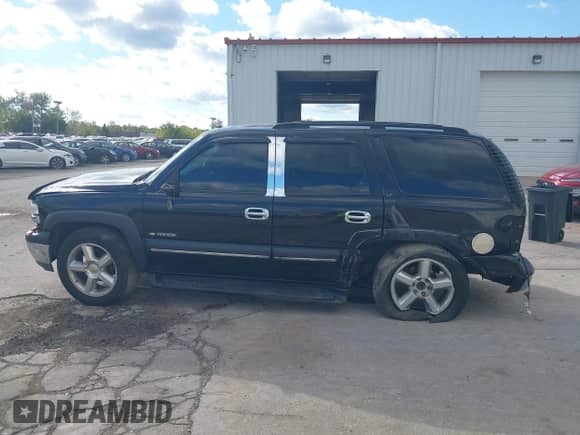 2002 Chevrolet Tahoe LT z VIN 1GNEK13Z62J202829, wystawiony jako IAAI lot #43409146 z przebiegiem Nie podano mil oraz . Historia ofert i sprzedaży dostępna na DreamBid. Obrazek 15.