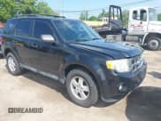 ✅ 2012 Ford Escape XLT • VIN: 1FMCU9DG3CKC30469 • Lot: 42450930. Listed on IAAI with 118,692 mi. Free auction sales archive from the USA and detailed vehicle history report at DreamBid. Image 1.