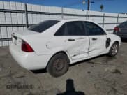 ✅ 2005 Ford Focus S • VIN: 1FAFP34N35W253238 • Lot: 91303485. Listed on Copart with 277,357 mi. Free auction sales archive from the USA and detailed vehicle history report at DreamBid. Image 3.