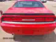 2014 Dodge Challenger SXT 100th Anniversary with VIN 2C3CDYAG0EH285477, listed as a IAAI auction lot 42298675 with 128,684 mi miles and . Bid and sale history available at DreamBid. Image 16.