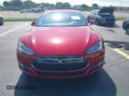 ✅ 2015 Tesla Model S 85 • VIN: 5YJSA1S11FF080601 • Lot: 42355445. Listed on IAAI with 56,391 mi. Free auction sales archive from the USA and detailed vehicle history report at DreamBid. Image 12.
