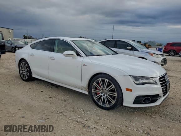 ✅ 2012 Audi A7 Prestige • VIN: WAU3GAFCXCN101812 • Лот: 94235265. Опубликован ранее на Copart с пробегом 103 711 миль. Бесплатный доступ к архиву аукционных продаж из США и подробный отчёт об истории автомобиля на DreamBid. Изображение 4.
