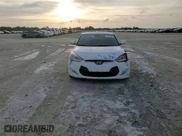 2012 Hyundai Veloster w/Red Int с VIN KMHTC6AD4CU076435, выставлен на аукционе Copart как лот 73015964 с пробегом 136 324 миль миль и Списание • Salvage title. История ставок и продаж доступна на DreamBid. Изображение 11.