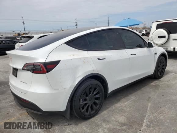 ✅ 2022 Tesla Model Y Long Range • VIN: 7SAYGDEE1NF540740 • Lot: 70879985. Wystawiony na Copart z przebiegiem 29 702 mil. Bezpłatny archiwum sprzedaży aukcyjnych z USA i szczegółowy raport historii pojazdu na DreamBid. Zdjęcie 3.