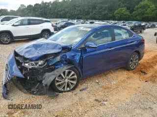 2022 Hyundai Accent Limited z VIN 3KPC34A64NE188969, wystawiony jako Copart lot #59518055 z przebiegiem 61 483 mil mil oraz Szkoda całkowita • Salvage title. Historia ofert i sprzedaży dostępna na DreamBid. Obrazek 1.