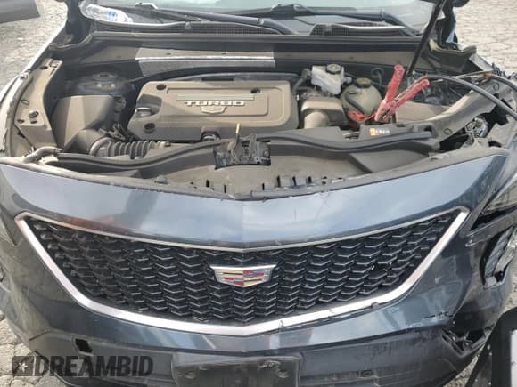 ✅ 2020 Cadillac XT4 FWD Sport • VIN: 1GYFZER41LF020790 • Lot: 86653815. Wystawiony na Copart z przebiegiem 98 117 mil. Bezpłatny archiwum sprzedaży aukcyjnych z USA i szczegółowy raport historii pojazdu na DreamBid. Zdjęcie 12.