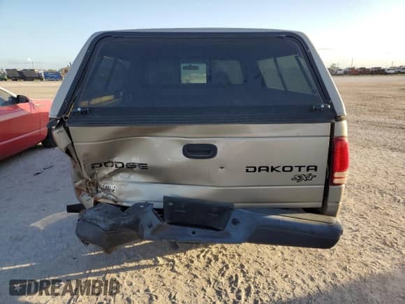 2004 Dodge Dakota with VIN 1D7GL12K94S627063, listed as a Copart auction lot 75315764 with 202,412 mi miles and Salvage title. Bid and sale history available at DreamBid. Image 6.