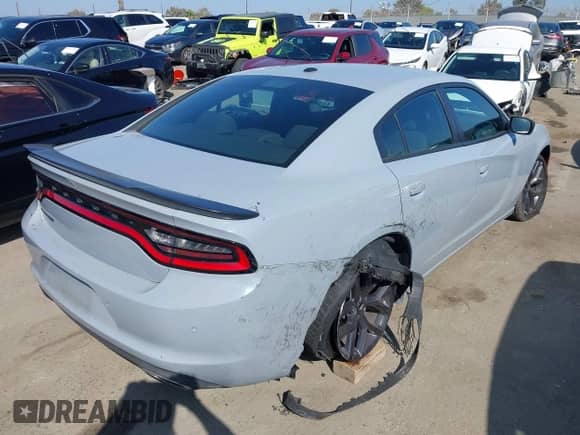 2021 Dodge Charger SXT with VIN 2C3CDXBG7MH507567, listed as a IAAI auction lot 43343265 with 53,576 mi miles and . Bid and sale history available at DreamBid. Image 4.