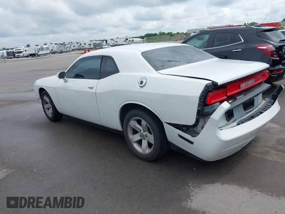 2014 Dodge Challenger Rallye Redline with VIN 2C3CDYAG6EH289856, listed as a IAAI auction lot 42866546 with 122,134 mi miles and . Bid and sale history available at DreamBid. Image 3.